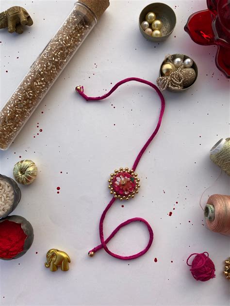 Miniature Pink Navratna Patola Enchanted Prakash Rakhi – IBHI