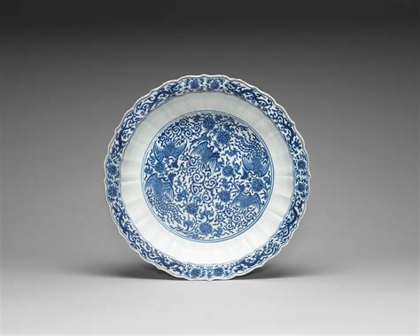 Bonhams : A blue and white Ming-style barbed-rim 'dragon and phoenix ...