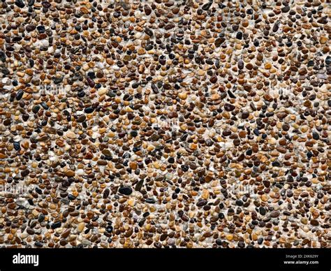 A pile of concrete tiles filled with rocks on top Stock Photo - Alamy