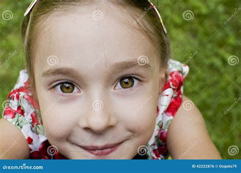 Girl Looking Up and Reaching for the Camera Stock Photo - Image of ...