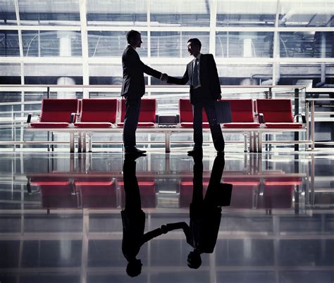 Business Handshake with Aeroplane Background Image 的图像结果