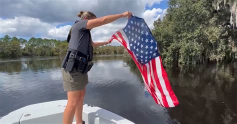 Florida deputies rescue American flag from swollen river after ...