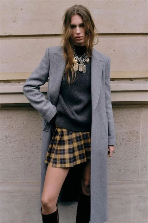 10 faldas de Zara para combinar con medias negras para vestir cómoda y ...