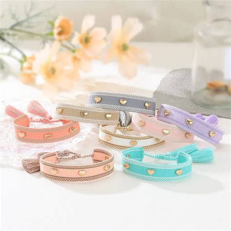 Discover the Elegance of Our Handmade Alloy Woven Heart Pendant Bracel