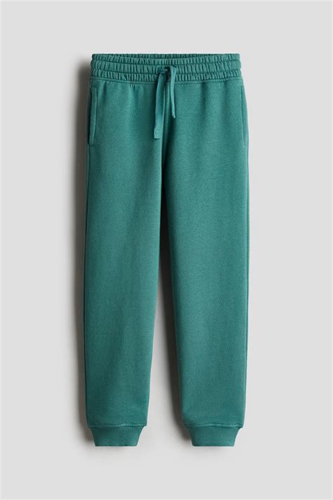 Cotton sweatshirt joggers - Green - Kids | H&M IN