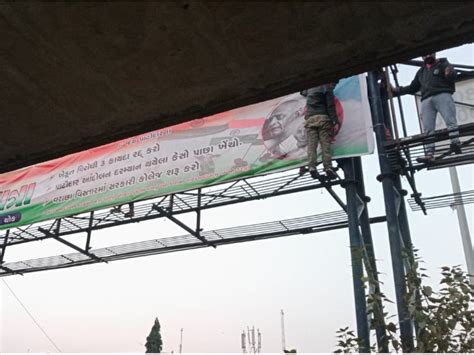 Outrage over removal of hoardings of Pass Tricolor Yatra in Surat ...