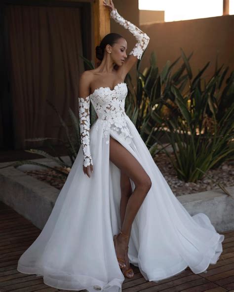 Slit wedding dress with beautiful flowers corset wedding dress with detachable sleeves light ...