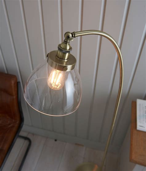 Brass and Clear Glass Shade Floor Lamp - Curved Base