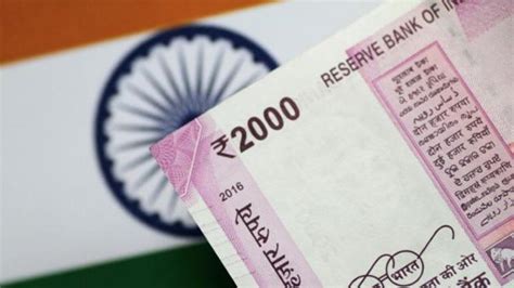 Rupee ends at 68.93 against US dollar, recovers after RBI intervention ...