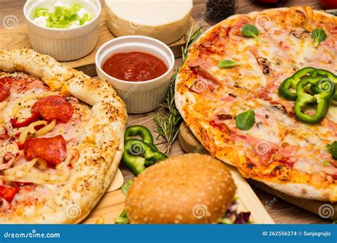 Pizza and Hamburger on Wooden Background Stock Photo - Image of healthy ...