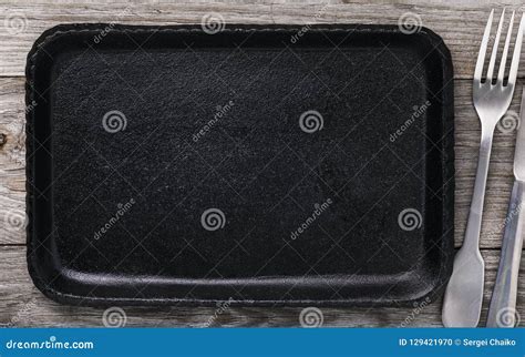 Cutlery and Cast Iron Baking Sheet with Copy Space Stock Photo - Image ...