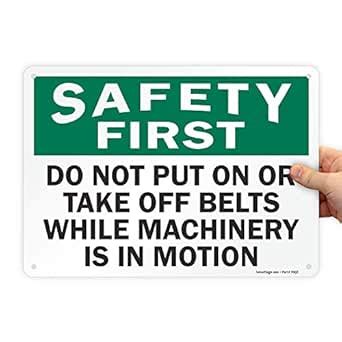 SmartSign "Safety First - Do Not Put On Or Take Off Belts, Machinery In ...