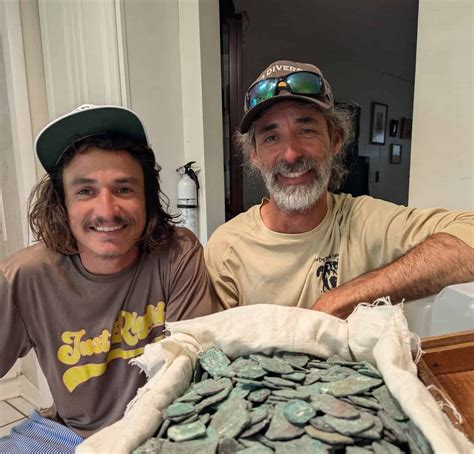 Lots of loot! Treasure divers find $1 million in Spanish silver coins ...