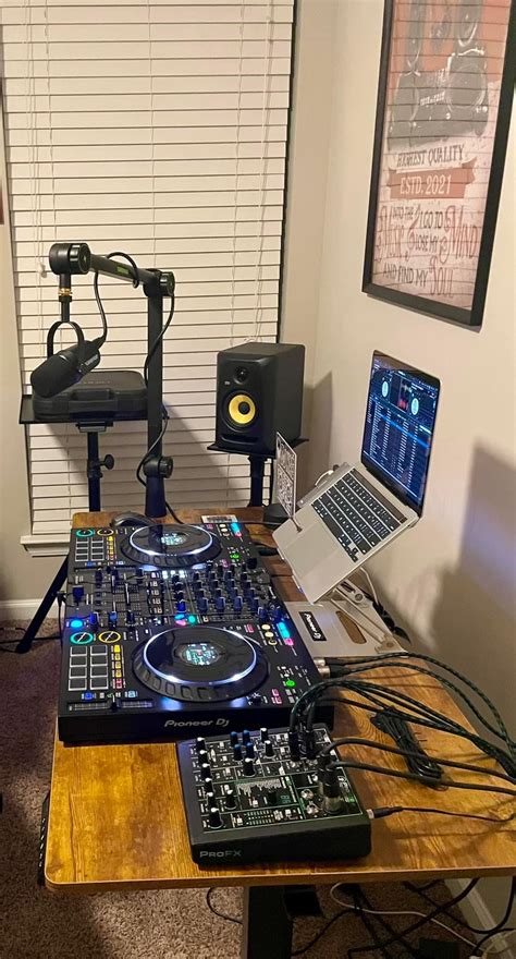 DJ Set with Laptops and Sound Equipment