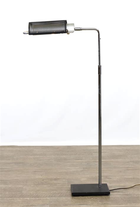George Nelson | Floor lamp with a perforated shade | MutualArt