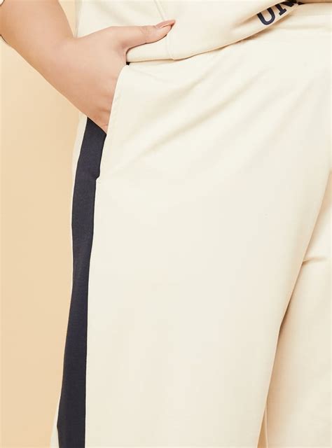 Buy Women Side Taped Sports Track Pants Online at just Rs. 999.0 ...