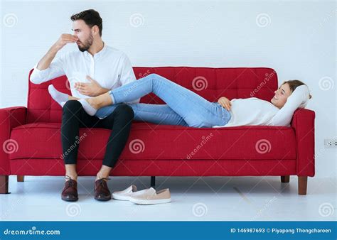 Couple With Problem Of Foot Odor And Bad Smell,Unpleasant Snuff Stink Stock Photo ... - what is the smell of feet