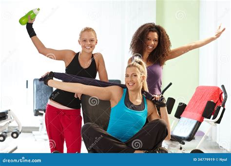Pretty Girls Posing at the Gym Stock Image - Image of exercises ...