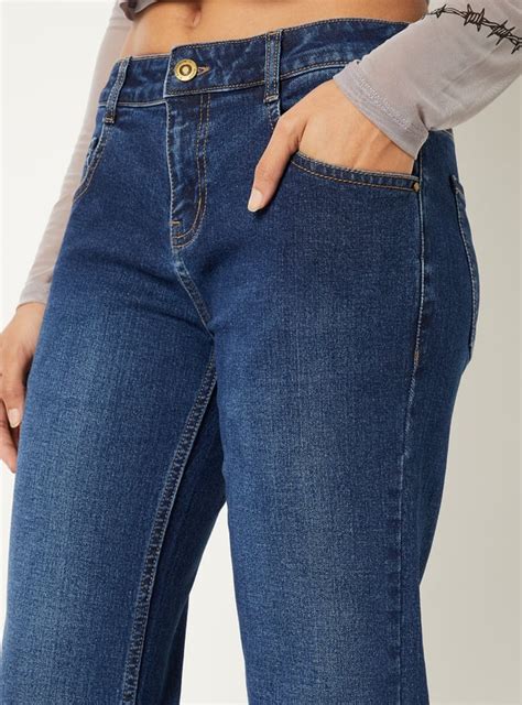 Buy Women Washed Kick Flare Jeans Online at just Rs. 1199.0 ...