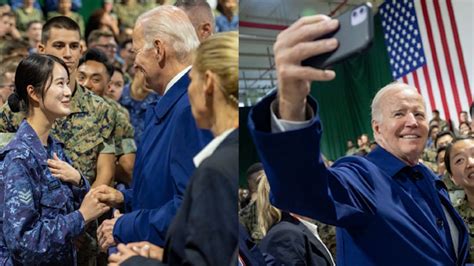 拜登飞抵广岛当天视察美军驻日基地 与女兵亲密握手还玩儿起自拍_腾讯视频