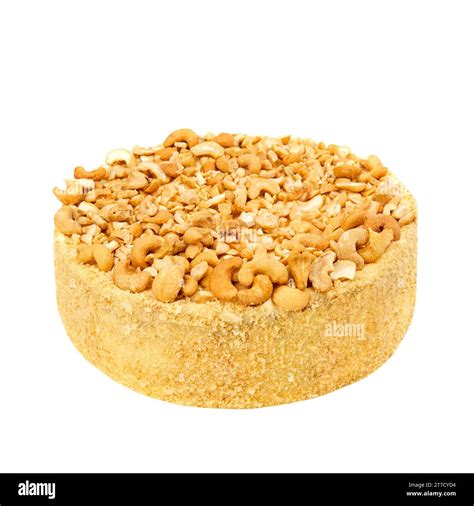 Cashew cake based on protein layers with cashews, custard and chocolate isolated on white Stock ...