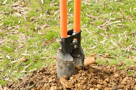 A Helpful Guide for How to Use a Post Hole Digger - ManMadeDIY