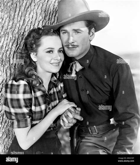 OLIVIA DE HAVILLAND and ERROL FLYNN in DODGE CITY (1939), directed by ...