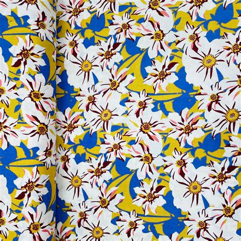 Buy Mustard With White Floral Print Rayon Fabric Online – TradeUNO Fabrics