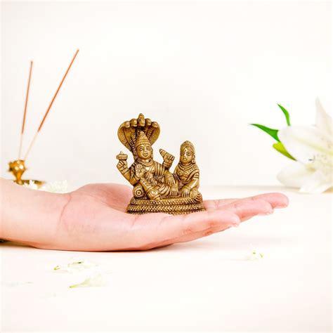 Brass Idol Of Lord Vishnu And Laxmi On Sheshnag Online - Premium ...
