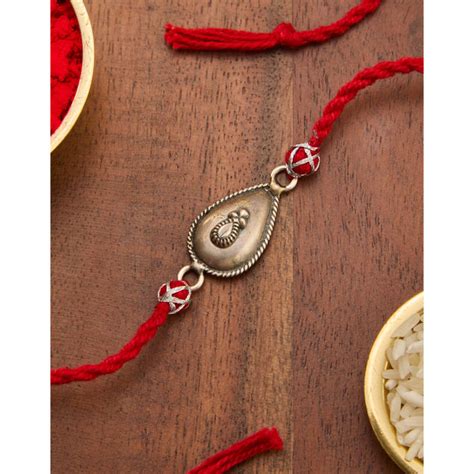 Buy Fabindia Silver Thread Rakhi with Roli Chawal Online