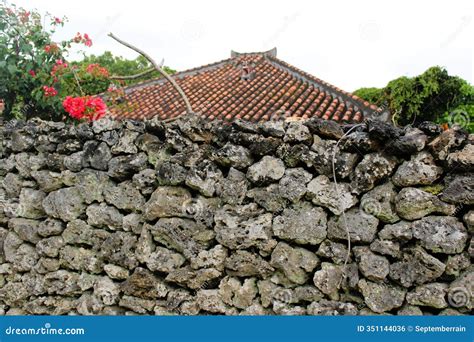 Traditional Ryukyu Style Orange Clay Tile Roof House with a Limestone ...