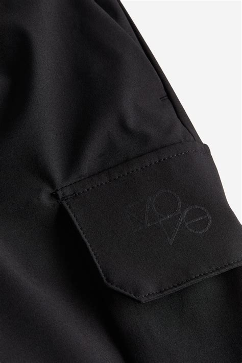 Mid-length cargo sports shorts in DryMove™ - Black - Men | H&M IN