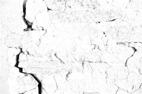 Cracked white plaster wall | Premium Photo