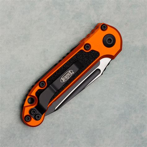 Microtech LUDT T/E Gen III Orange Serrated 1136-2OR | American Edge Knives