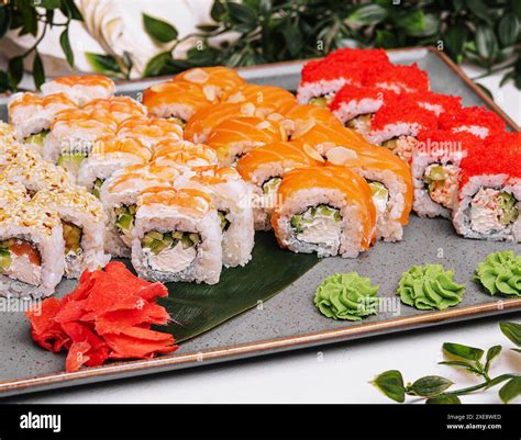 Four different types of sushi rolles Stock Photo - Alamy