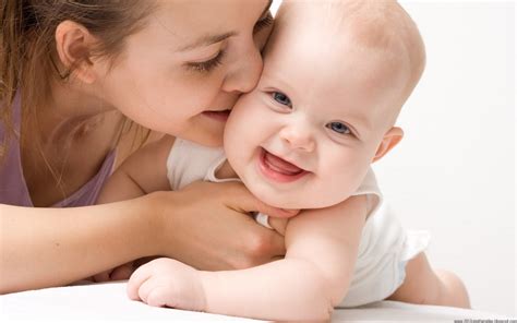 Happy Mother With Baby Free Stock Photo - Public Domain Pictures
