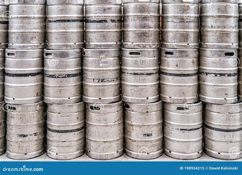 Wall of Used and Scratched Stainless Steel Beer Barrels or Kegs Stock ...