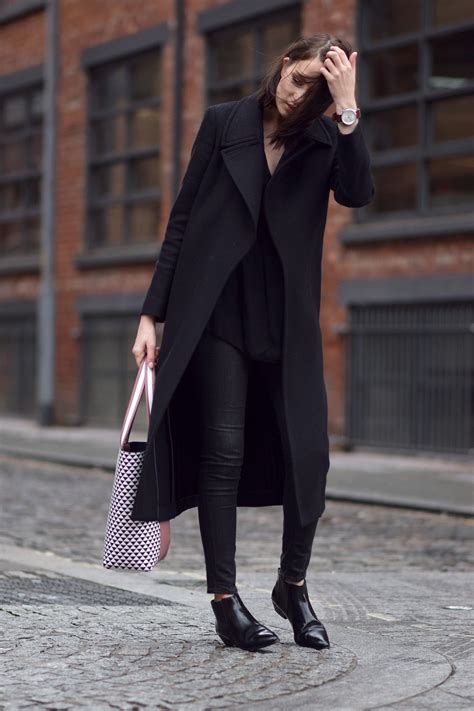A long black coat always looks chic, and I can't get enough of black ...