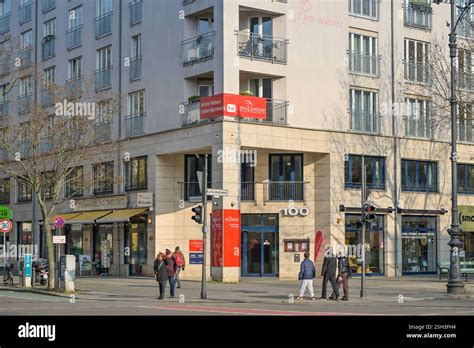 Emergency vehicles from the aid organization "Die Johanniter" pick up residents of a retirement home in Berlin, Germany, Saturday, Jan. 3, 2025, during a power cut in south-west Berlin after a fire on a cable bridge. (Michael Ukas/dpa via AP)