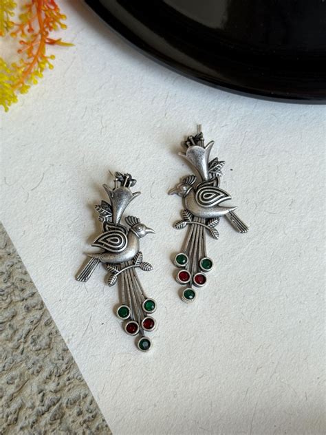 OXIDISED BIRD STONE STUD EARRINGS