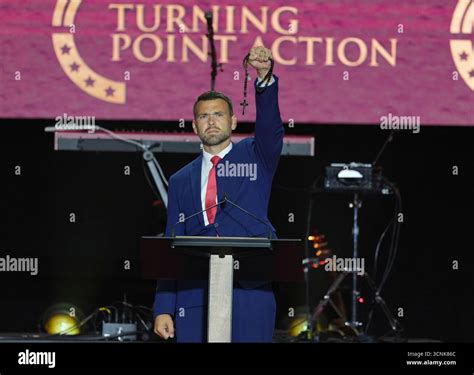 Jack Posobiec speaks at a memorial for Charlie Kirk, Sunday, Sept. 21 ...