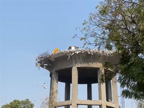 Ahmedabad: 10-Story Water Tank Demolished Using Excavator