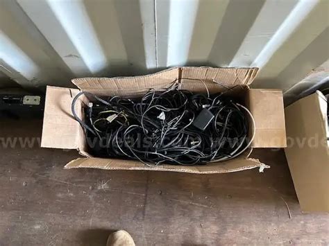 Two Boxes - Assorted electronic cables | AllSurplus