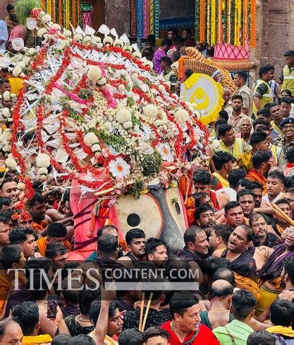 Ratha Yatra Feature Photo Devotees participate in the t...