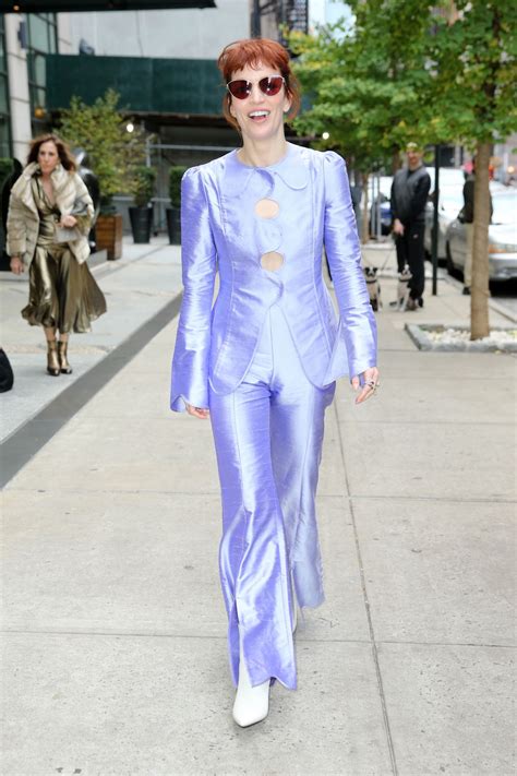 Britt Lower Wears a Purple Pants Suit and White Boots - New York 11/13 ...