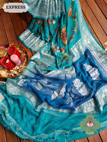 Zynah Turquoise Pure Khaddi Georgette Banarasi Saree with Silver Zari ...