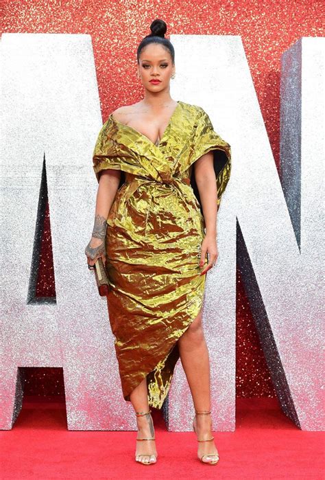 The New Fashion Leader of The Day : Rihanna chose a gold wrap dress by ...
