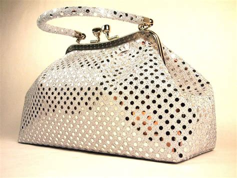 Angel Present Handbag by WiseGloves Eve Metallic Silver Handbag Purse ...