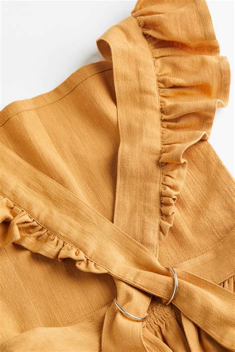 Flounce-trimmed apron - Yellow - Home All | H&M IN
