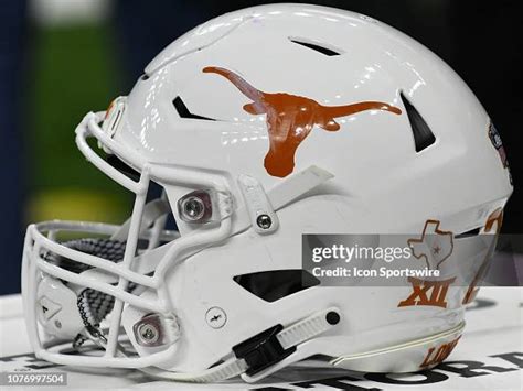 A Texas Longhorns football helmet sits on the sideline during the ...